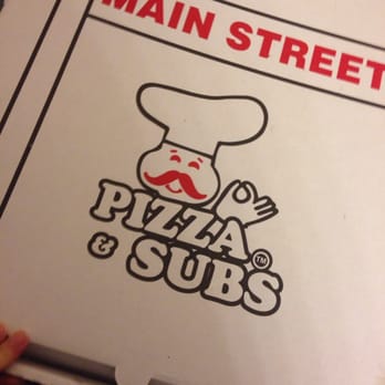 Main Street Pizza - a hand holding a pizza box - Pizza Near Me - Ovid, Michigan Main Street Pizza - a hand holding a pizza box - Pizza Near Me - Ovid, Michigan