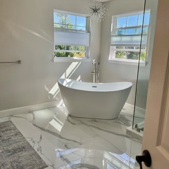 Liberty Homes - a bathtub in a bathroom - General Contractors Near Me Liberty Homes - a bathtub in a bathroom - General Contractors Near Me