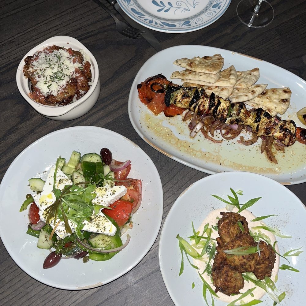 Avli - Geek fries, Horiatiki salad, zucchini fritters, chicken souvlaki - Greek Near Me - Milwaukee, Wisconsin Avli - Geek fries, Horiatiki salad, zucchini fritters, chicken souvlaki - Greek Near Me - Milwaukee, Wisconsin