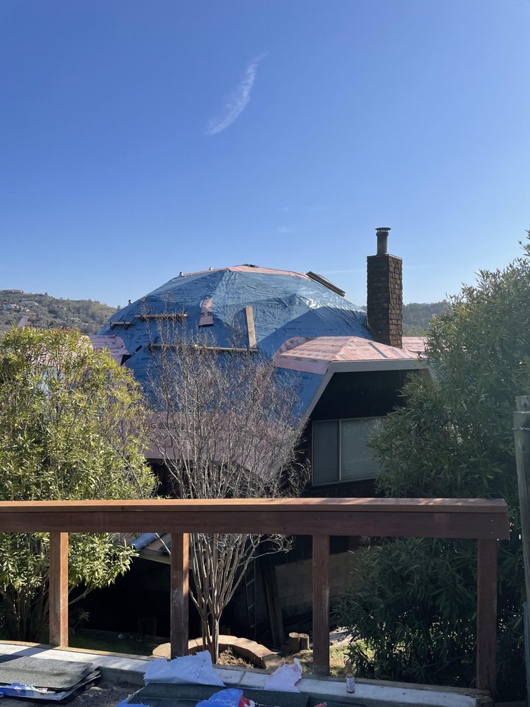 Slide of King Bee Roofing