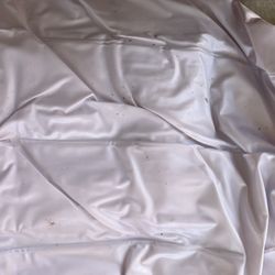 River City Furniture Auction - Dirt-covered floating pool cover.