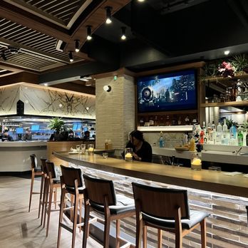 Wood Ranch Manhattan Beach - Seating bar and kitchen view - American Near Me - Manhattan Beach, California Wood Ranch Manhattan Beach - Seating bar and kitchen view - American Near Me - Manhattan Beach, California