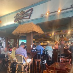 Wahoo's Waterside Pub & Patio - Casual vibe with tables and a long bar