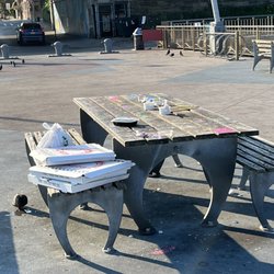 Garbage all over the place. Need more garbage cans on the pier attached to the fence. There are five garbage cans on the whole pier.