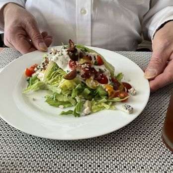 RHouse Wine & Cafe - a man holding a plate of salad - Tapas/Small Plates Near Me - Basye, Virginia RHouse Wine & Cafe - a man holding a plate of salad - Tapas/Small Plates Near Me - Basye, Virginia
