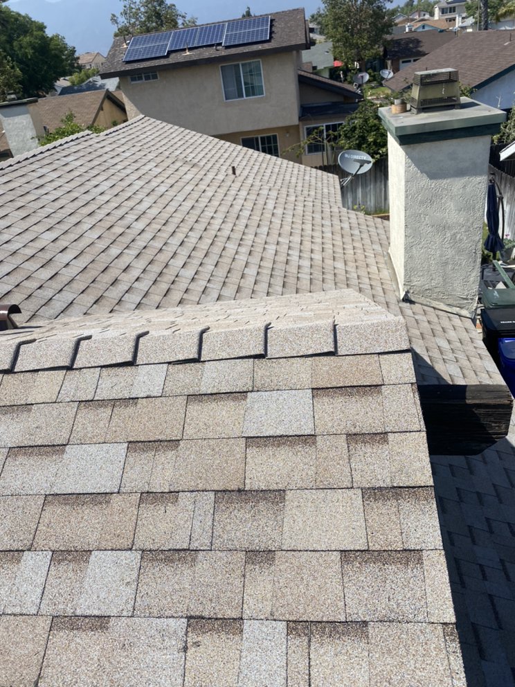 Slide of Goliath Roofing