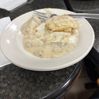 Savannah Taste Experience - Biscuits and gravy from Quinn's (I'd already eaten half of it) - Food Tours Near Me - Savannah, Georgia Savannah Taste Experience - Biscuits and gravy from Quinn's (I'd already eaten half of it) - Food Tours Near Me - Savannah, Georgia