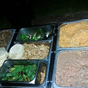 Tacos La Raza Catering - Steam table with the taco meats rice and beans! - Caterers Near Me Tacos La Raza Catering - Steam table with the taco meats rice and beans! - Caterers Near Me
