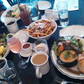 Heritage Tavern - Amazing brunch with a plethora of edibles. The perfect biscuits and gravy is featured on the right hand side. - New American Near Me - Madison, Wisconsin Heritage Tavern - Amazing brunch with a plethora of edibles. The perfect biscuits and gravy is featured on the right hand side. - New American Near Me - Madison, Wisconsin