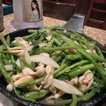 One Hot Pot & Grill - Razor clam sautéed in rau muốn - Vietnamese Near Me - Houston, Texas