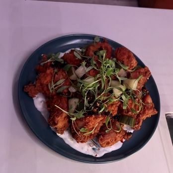 Cavaña - CHICHARRON DE POLLO  fried chicken thighs, coriander crema, salsa macha, herbed cucumber - Cocktail Bars Near Me - San Francisco, California