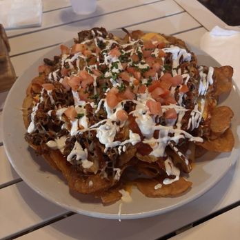 Moonshine Deck - Brisket nachos on potato chips - American Near Me - Houston, Texas