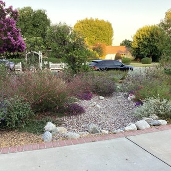 Hope Gardens - The DWP mandates some sort of "water retention feature". We opted for a dry riverbed and it turned out really nicely. - Gardeners Near Me Hope Gardens - The DWP mandates some sort of "water retention feature". We opted for a dry riverbed and it turned out really nicely. - Gardeners Near Me