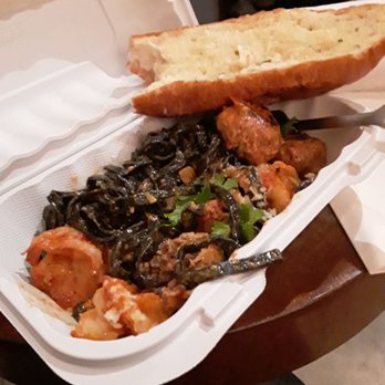 Grassa - The squid ink fettuccine with a side of garlic bread. - Italian Near Me - Portland, Oregon Grassa - The squid ink fettuccine with a side of garlic bread. - Italian Near Me - Portland, Oregon