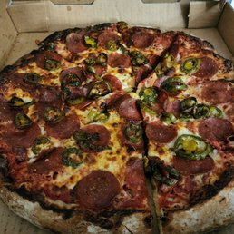 Pepperoni and jalapeño pizza. Well-done ...not burnt Pepperoni and jalapeño pizza. Well-done ...not burnt