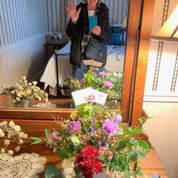 Flowers by Lani - This is my mom in her hotel room feeling special on her birthday. Thank you for making this possible Lani!