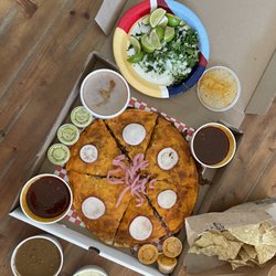 Birrieria Mama Rosa 5 - Birria Pizza (1 Pound of Birria) Queso, Salsa, Consome x3 and all the fixins.