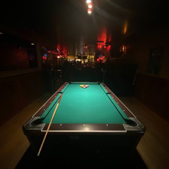 Swig - a pool table in a dimly lit room - Bars Near Me - Chicago, Illinois Swig - a pool table in a dimly lit room - Bars Near Me - Chicago, Illinois