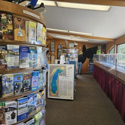 Michigan Welcome Center-St Ignace - Interior with pamphlets and model of Mackinac bridge