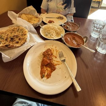 Punjab Kitchen - We ordered butter chicken, chicken vindaloo, garlic naan, and cheese naan - Indian Near Me - Kissimmee, Florida Punjab Kitchen - We ordered butter chicken, chicken vindaloo, garlic naan, and cheese naan - Indian Near Me - Kissimmee, Florida