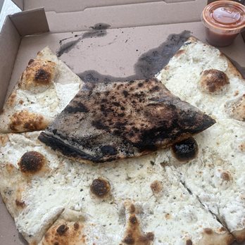 Grimaldi's Pizzeria - Burnt including ashes and wet White with Garlic Pizza - Pizza Near Me - San Antonio, Texas Grimaldi's Pizzeria - Burnt including ashes and wet White with Garlic Pizza - Pizza Near Me - San Antonio, Texas