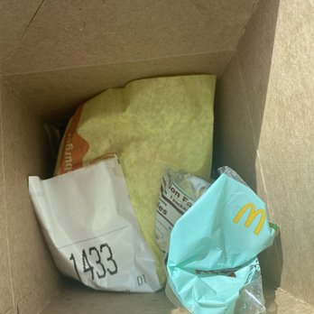 McDonald's - They couldn't even be bothered to wrap the cheeseburger up before throwing it in the happy meal box - Fast Food Near Me - Corona, California McDonald's - They couldn't even be bothered to wrap the cheeseburger up before throwing it in the happy meal box - Fast Food Near Me - Corona, California