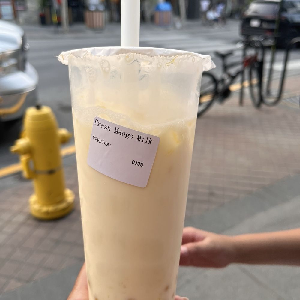 Fresh Mango milk with mango popping boba Fresh Mango milk with mango popping boba
