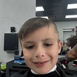 Mikes Custom Kuts - The barber giving me the fade haircut.