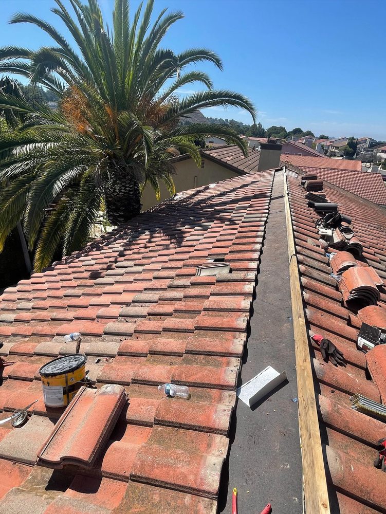 Slide of Ortiz Roofing