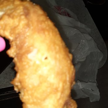 Tea House - a hand holding a fried food item - Chinese Near Me - Lakewood, Washington Tea House - a hand holding a fried food item - Chinese Near Me - Lakewood, Washington
