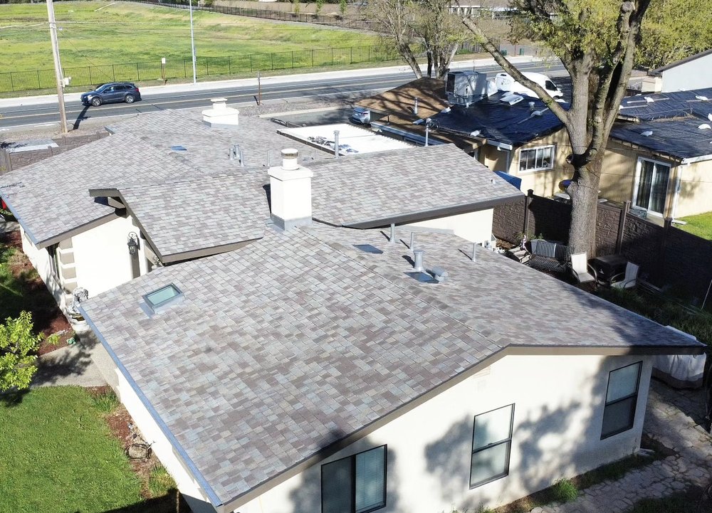 Slide of VIK Quality Roofing