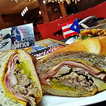 Saborico - a cut in half sandwich on a plate - Puerto Rican Near Me - Detroit, Michigan