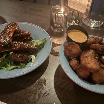 Prohibition Port Jefferson - Appetizers..sticky spicy ribs and fried pickles - New American Near Me - Port Jefferson, New York