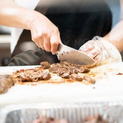 Bites at the Vineyard - Preparing fajitas for a catering order.