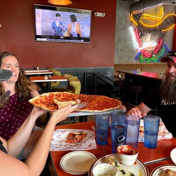 Fat Sully's NY Pizza - Tennyson - a group of people eating pizza - Pizza Near Me - Denver, Colorado Fat Sully's NY Pizza - Tennyson - a group of people eating pizza - Pizza Near Me - Denver, Colorado