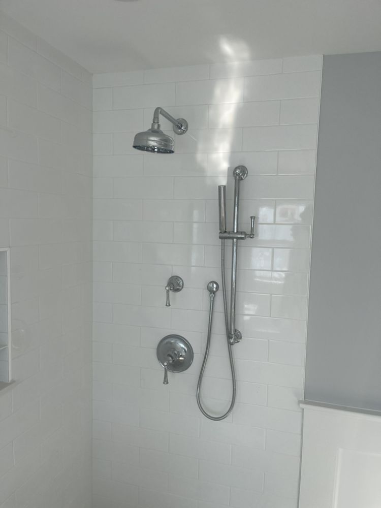 Slide of Lou's Plumbing