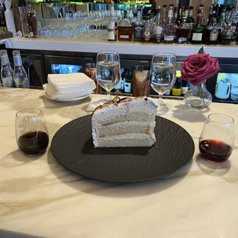 Carmine's - Vanilla layer cake, port and sherry dessert wine! - Italian Near Me - Bellevue, Washington Carmine's - Vanilla layer cake, port and sherry dessert wine! - Italian Near Me - Bellevue, Washington
