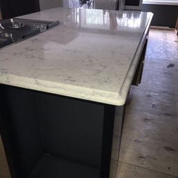The beautiful granite countertop on my parents' kitchen island. Thanks Momax!