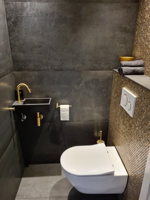 Grand Ave Plumbing and Heating Logo