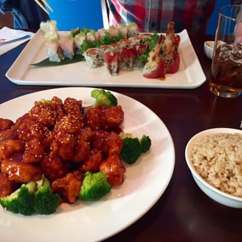 Sakura Asian Cuisine - Sesame chicken with brown rice, and 3 sushi rolls (the Pottstown roll,  the green river roll, and I forget the last one) - Japanese Near Me - Pottstown, Pennsylvania