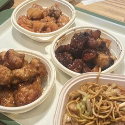 Orange peel chicken, honey walnut shrimp, pork belly, & chow mein Orange peel chicken, honey walnut shrimp, pork belly, & chow mein