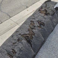 Davis Inspection Services - Damaged cap shingles