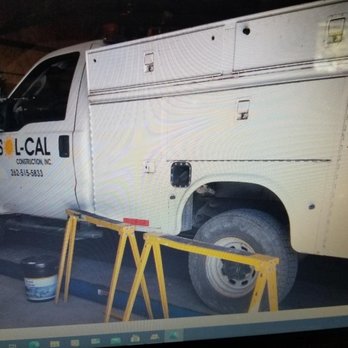 Sol-Cal Construction - a truck parked in a garage - Masonry/Concrete Near Me - Antioch, Illinois