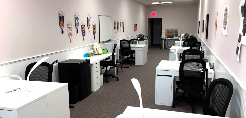 Emily's Stitchery Logo