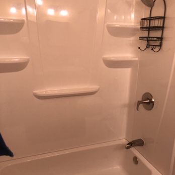 Benitez Carpentry & Renovation - New tub, surround and fixtures! - Flooring Near Me - Durham, North Carolina
