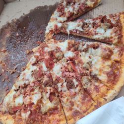Angela-Mia Pizza - Over cooked no extra cheese