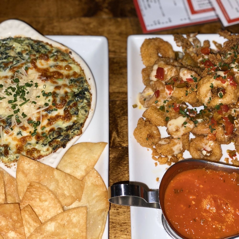 Salt Factory Pub - Calamari and spinach artichoke dip. - Gastropubs Near Me - Alpharetta, Georgia Salt Factory Pub - Calamari and spinach artichoke dip. - Gastropubs Near Me - Alpharetta, Georgia