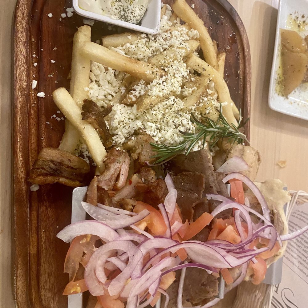 Molos Greek Taverna - Wheaton - Gyro flight - Greek Near Me - Wheaton, Illinois Molos Greek Taverna - Wheaton - Gyro flight - Greek Near Me - Wheaton, Illinois