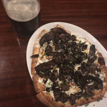 Blackthorn Pub - Mushroom pizza with goat cheese and truffle oil. - Pubs Near Me - Holly, Michigan Blackthorn Pub - Mushroom pizza with goat cheese and truffle oil. - Pubs Near Me - Holly, Michigan