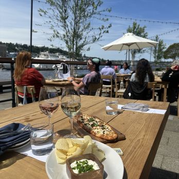The Cove - Patio, Chicken and Truffle Pizza, Chips and Cremé Fresh - Wine Bars Near Me - Seattle, Washington The Cove - Patio, Chicken and Truffle Pizza, Chips and Cremé Fresh - Wine Bars Near Me - Seattle, Washington